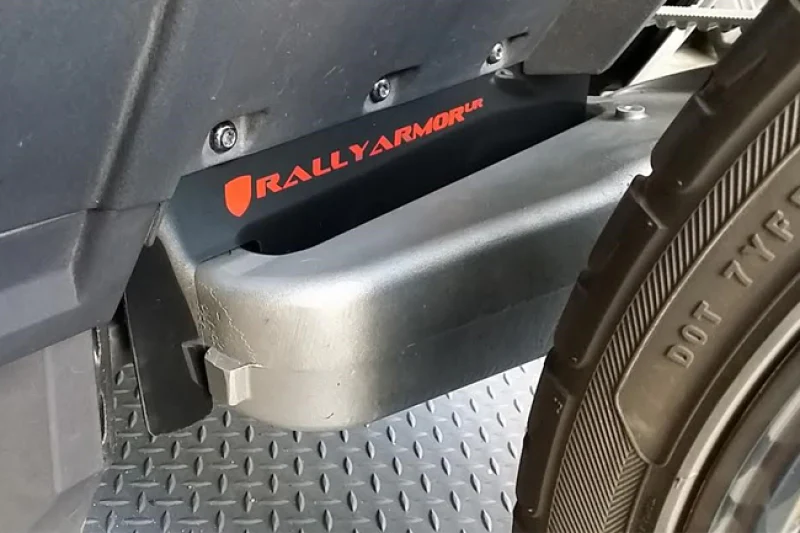 Rally Armor 15-24 Polaris Slingshot Rear Swingarm Black UR Mud Flap w/Orange Logo (MOQ 200 PCS) - Image 2